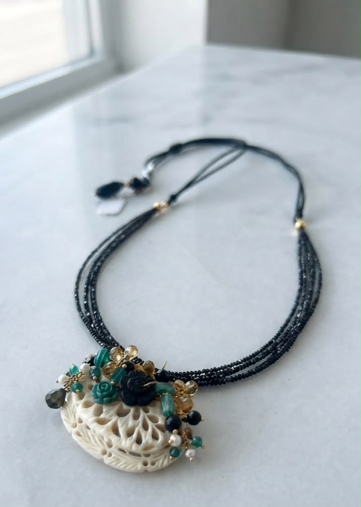 Carved Ivory Garden Cascade Necklace – Hand-Carved Ivory-Toned Elements Cascading Like Garden Blossoms