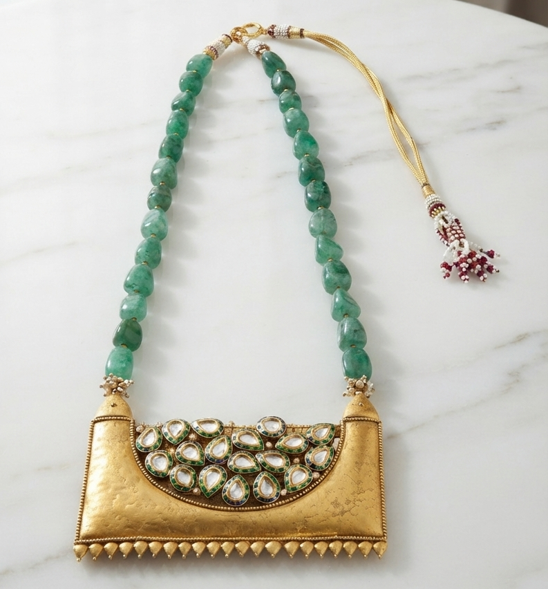Maya Emerald Statement Necklace - broad emerald stone collar with gold filigree and pendant drops