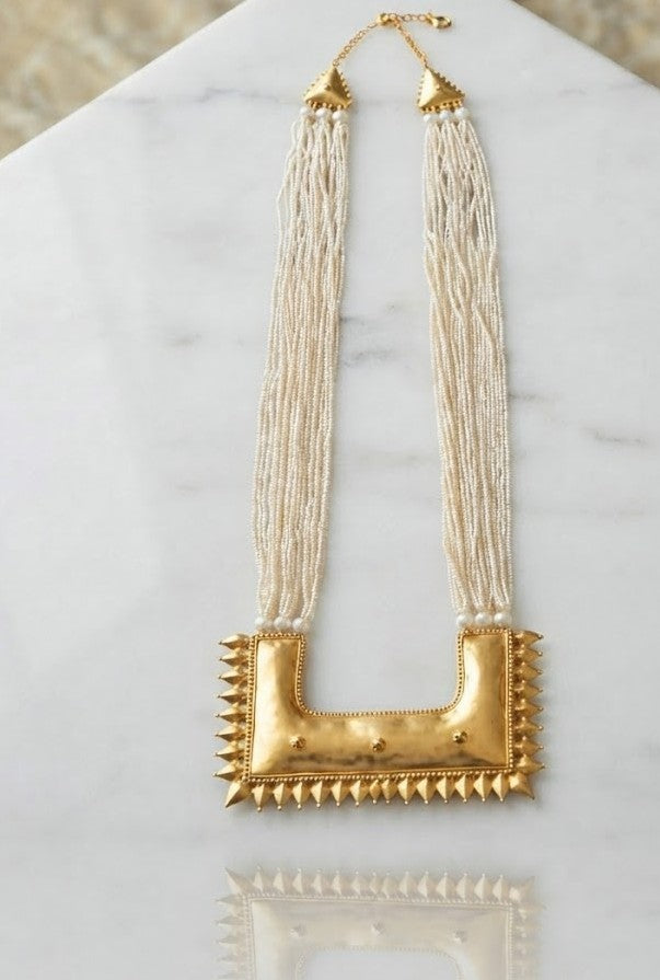 Maya Pearl Long Necklace - multi-strand freshwater pearl necklace with ornate gold pendant centrepiece