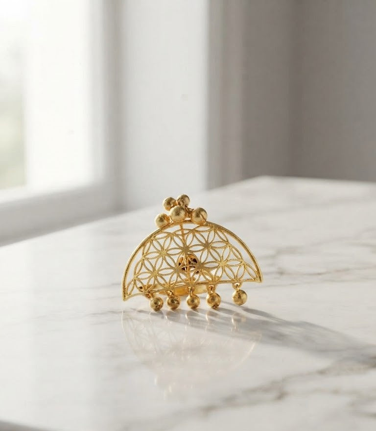 Maya Geometric Ring - bold angular gold-tone ring with textured geometric detailing