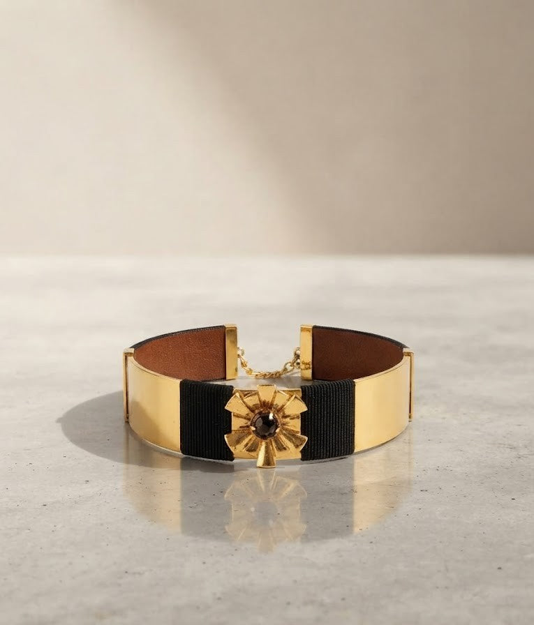 Metal Blast Golden Orbit Choker - gold plates with textured black band and stone sunburst