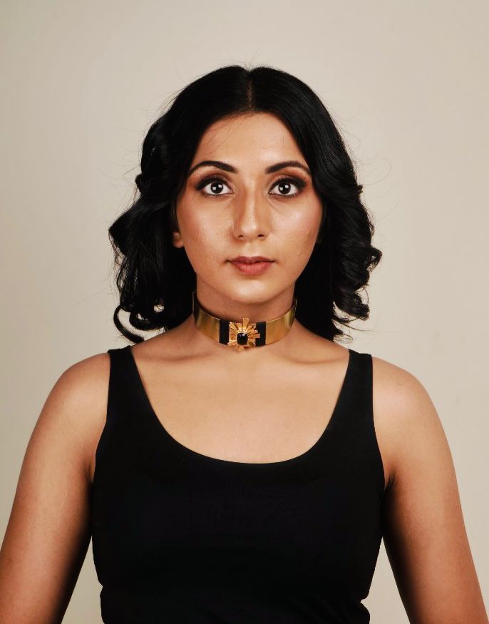 Metal Blast Black-Accented Choker - gold choker with black accents and geometric sunburst