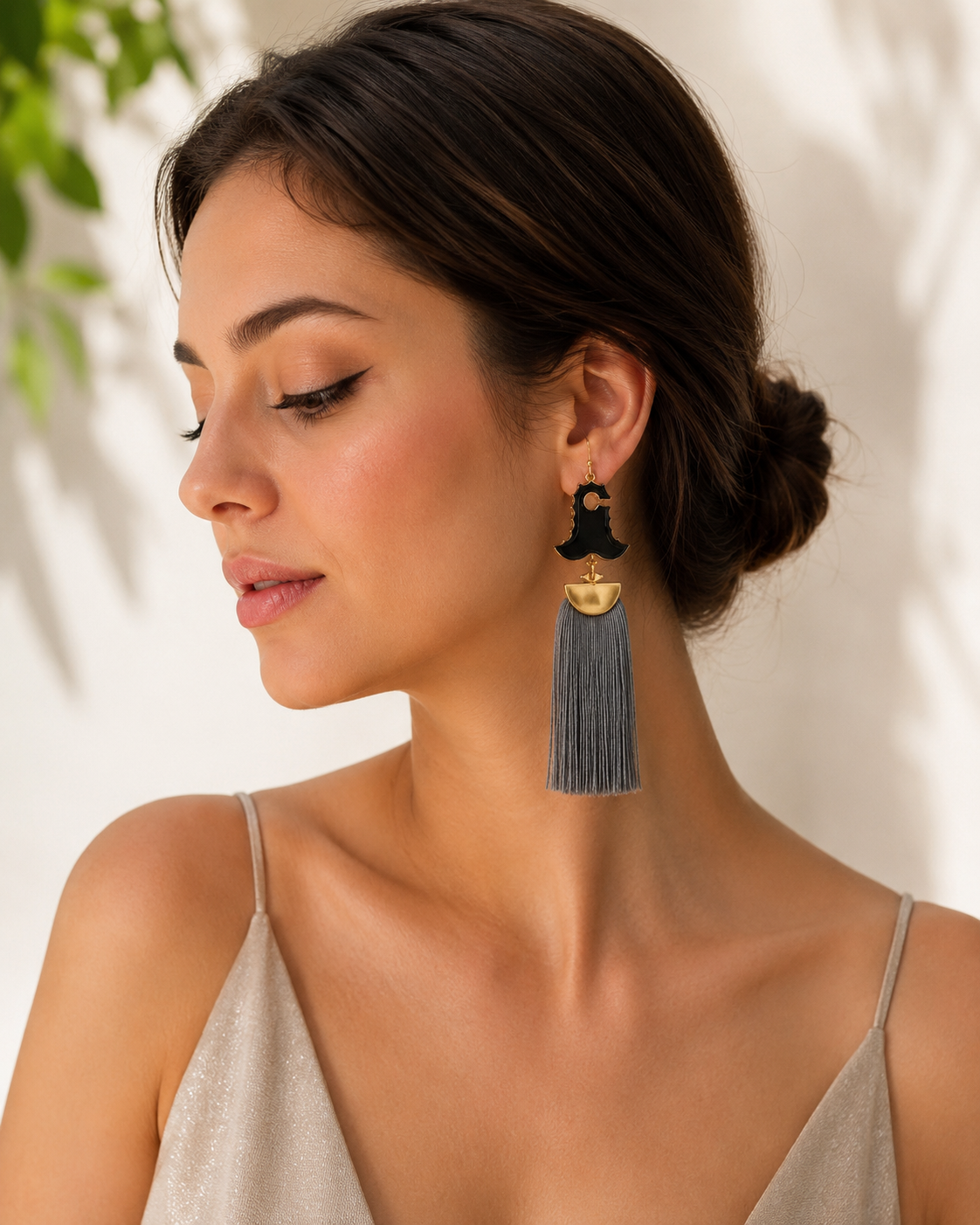The Sahitiya Dusk Tassels – model wearing contemporary gold and grey silk tassel earrings