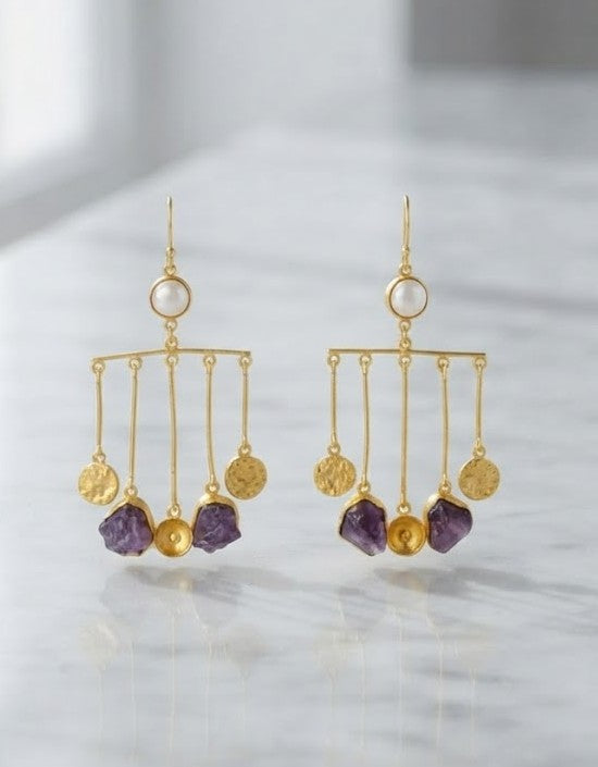 Amethyst Sunburst Chandelier Earrings — raw purple amethyst with pearl top and gold bar frame from Stone Age by Mine of Design